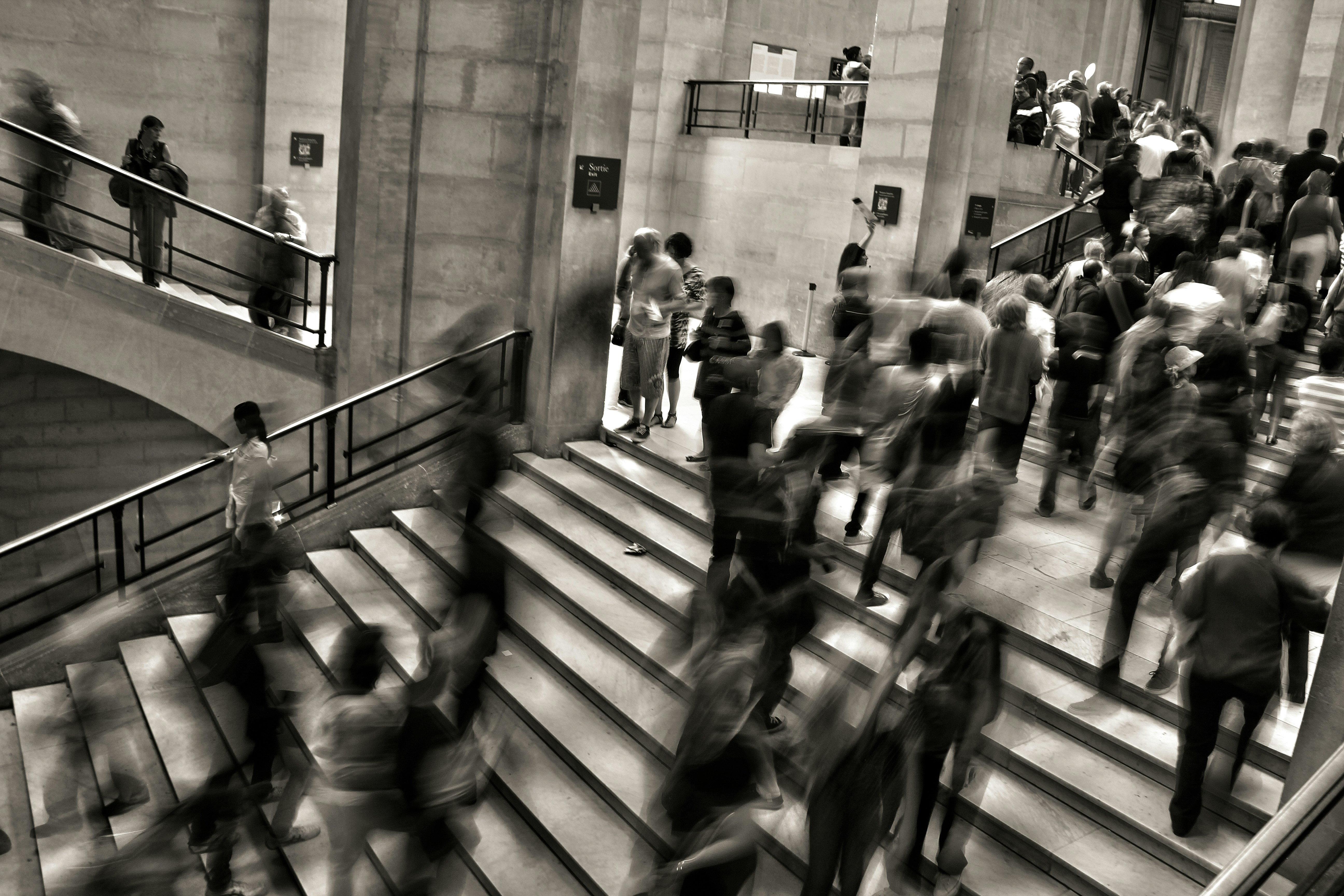 Photo of a group of people going to or coming home from work